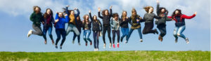 Ursuline College Girls jumping in air